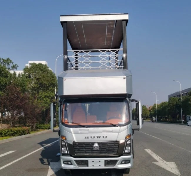 HOWO 4x4 Pop-up Roof Movable Recreational Vehicle for Camping and Travel, New, Automatic Transmission, EURO 6, Gasoline, Dimensions 5995x2490x3400 mm, Max Payload 6495 kg, Includes Kitchen and Bathroom Features